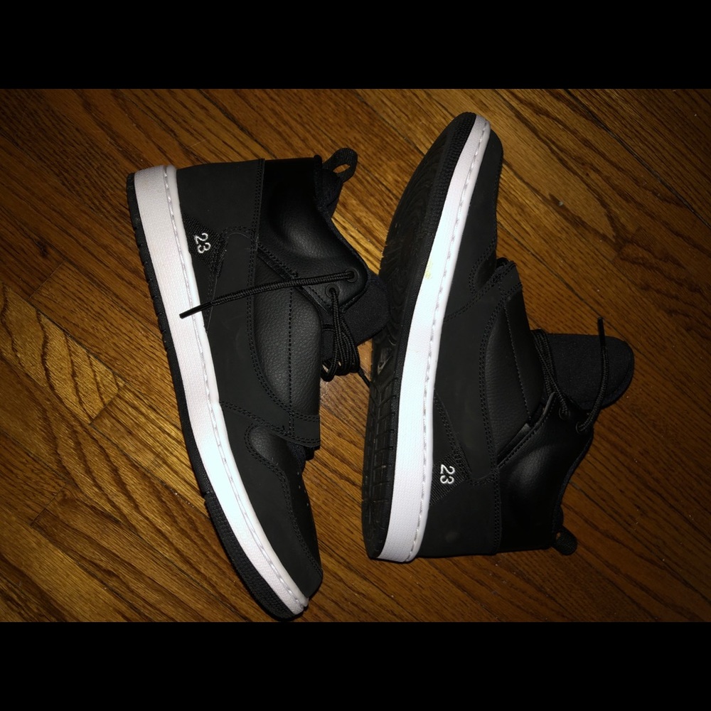 Black hi-top Jordan shoes